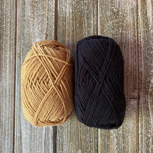 Mustard and black yarn