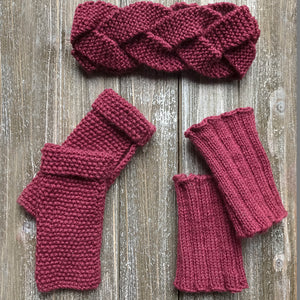 Knitted sample of the headband, fingerless gloves and bootcuffs in wine colour
